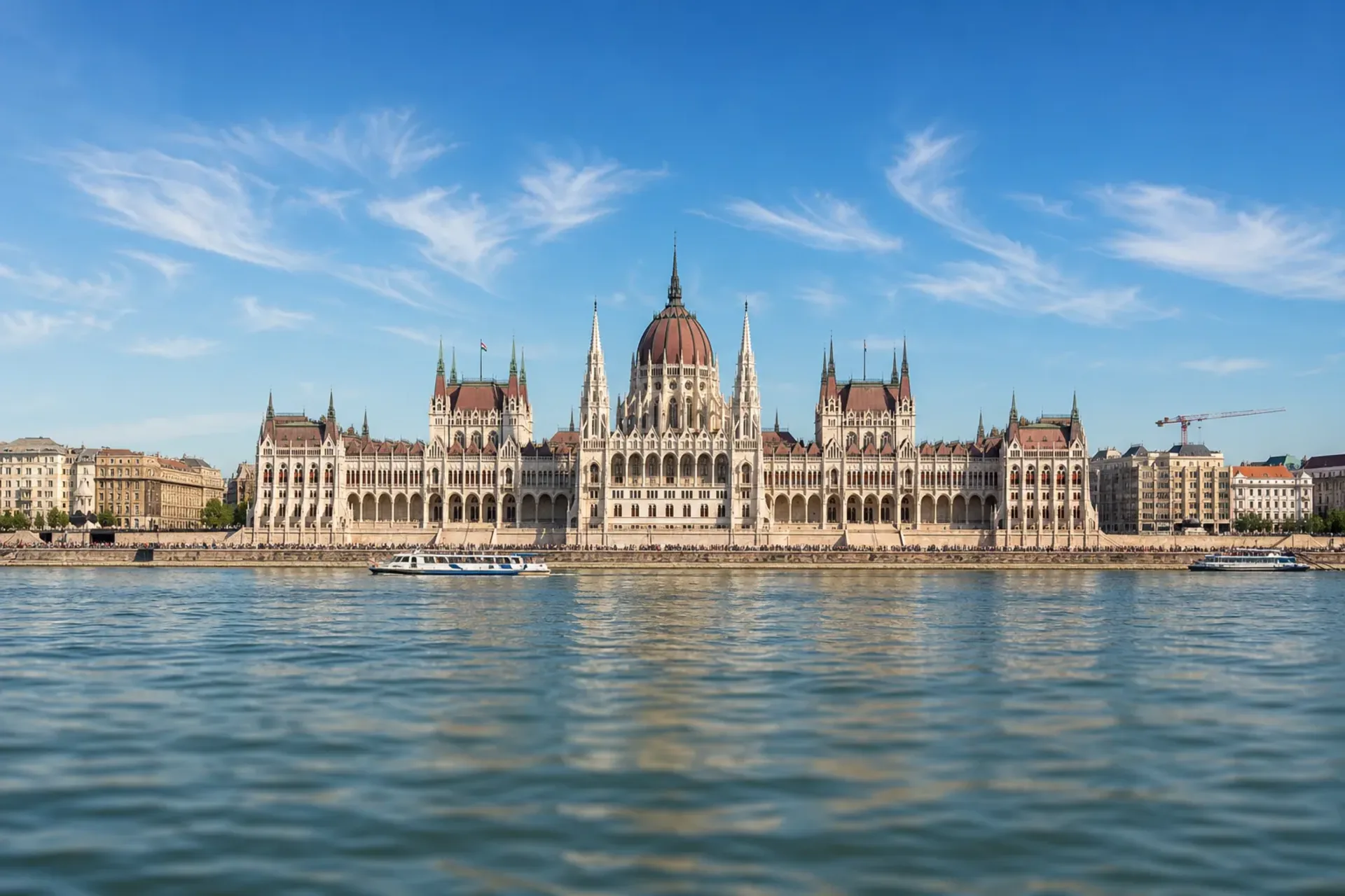 Germany, Austria & Hungary-The illuminated Hungarian Parliament building in Budapest seen from the river during a Cruise Heart of Europe.
