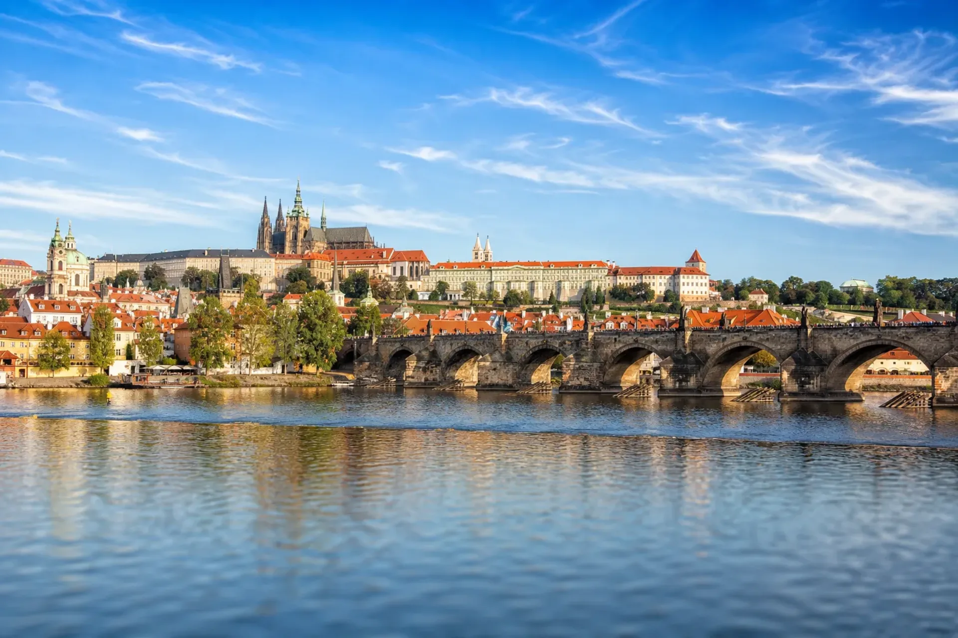 Czech Republic-The iconic Charles Bridge and Prague Castle in the background during a Don Giovanni Prague escorted tour.
