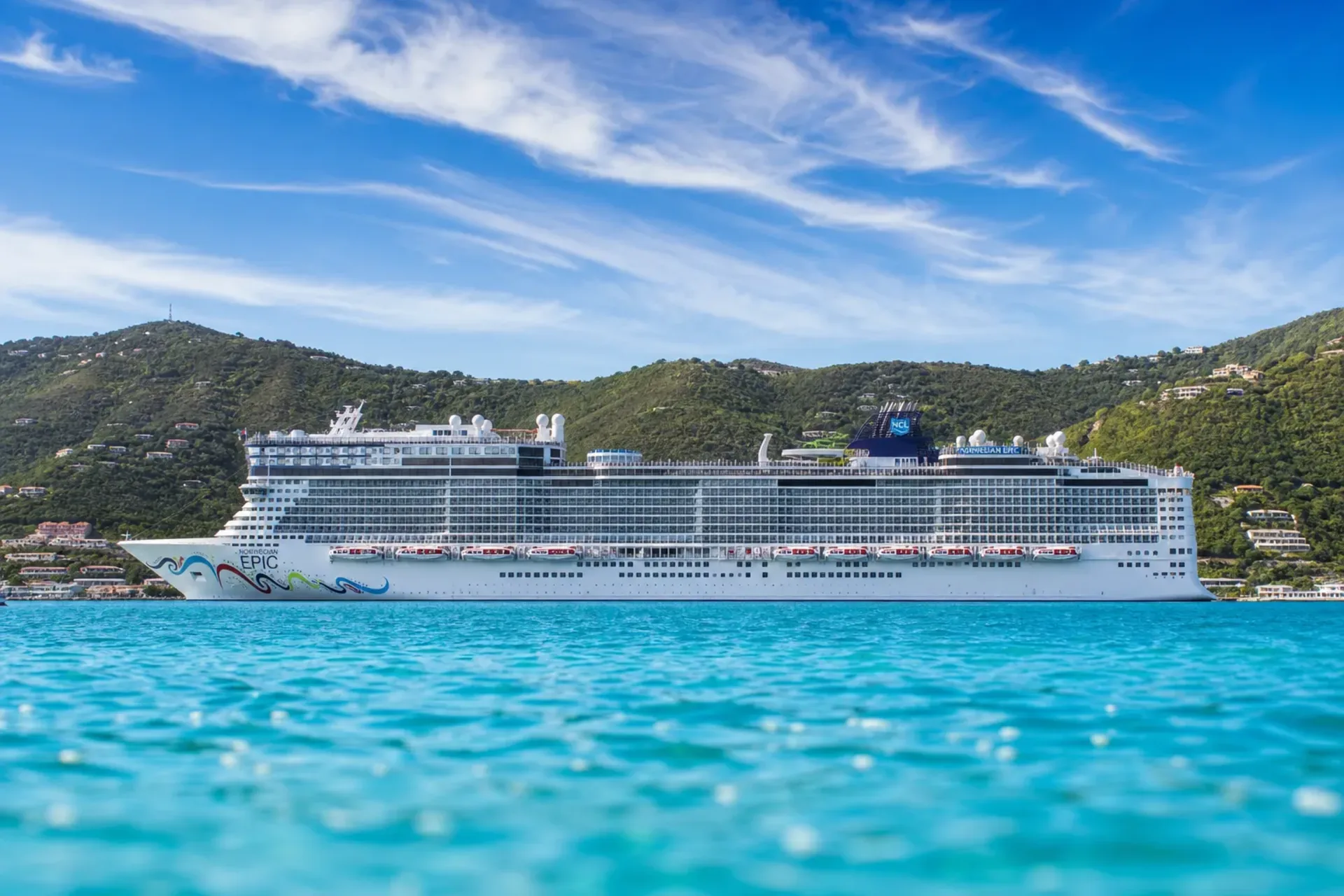 Caribbean & USA-The Norwegian Epic cruise ship anchored in the bright blue waters of St. Thomas during an Epic Transatlantic cruise.