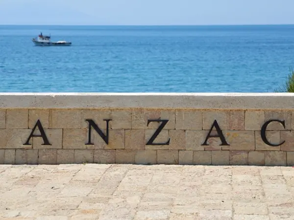 The historic ANZAC memorial stone wall overlooking the sea at Gallipoli, an important commemorative stop on our WW1 Istanbul and Gallipoli battlefield tours.